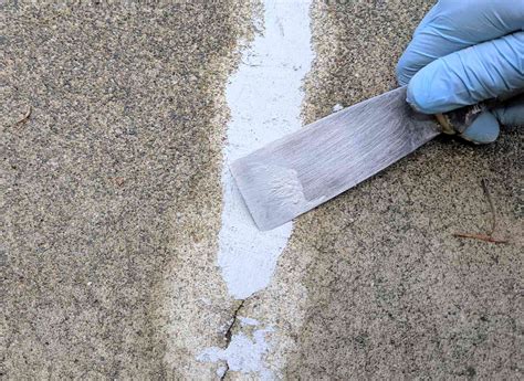 how to repair cracks in concrete walls before painting